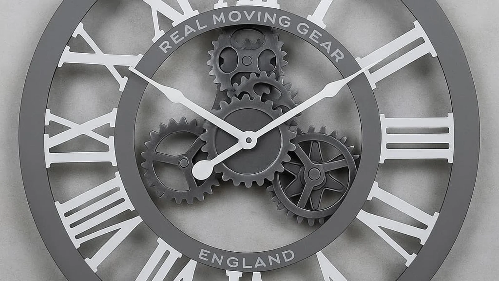 warm office wall clock and office workflow scene